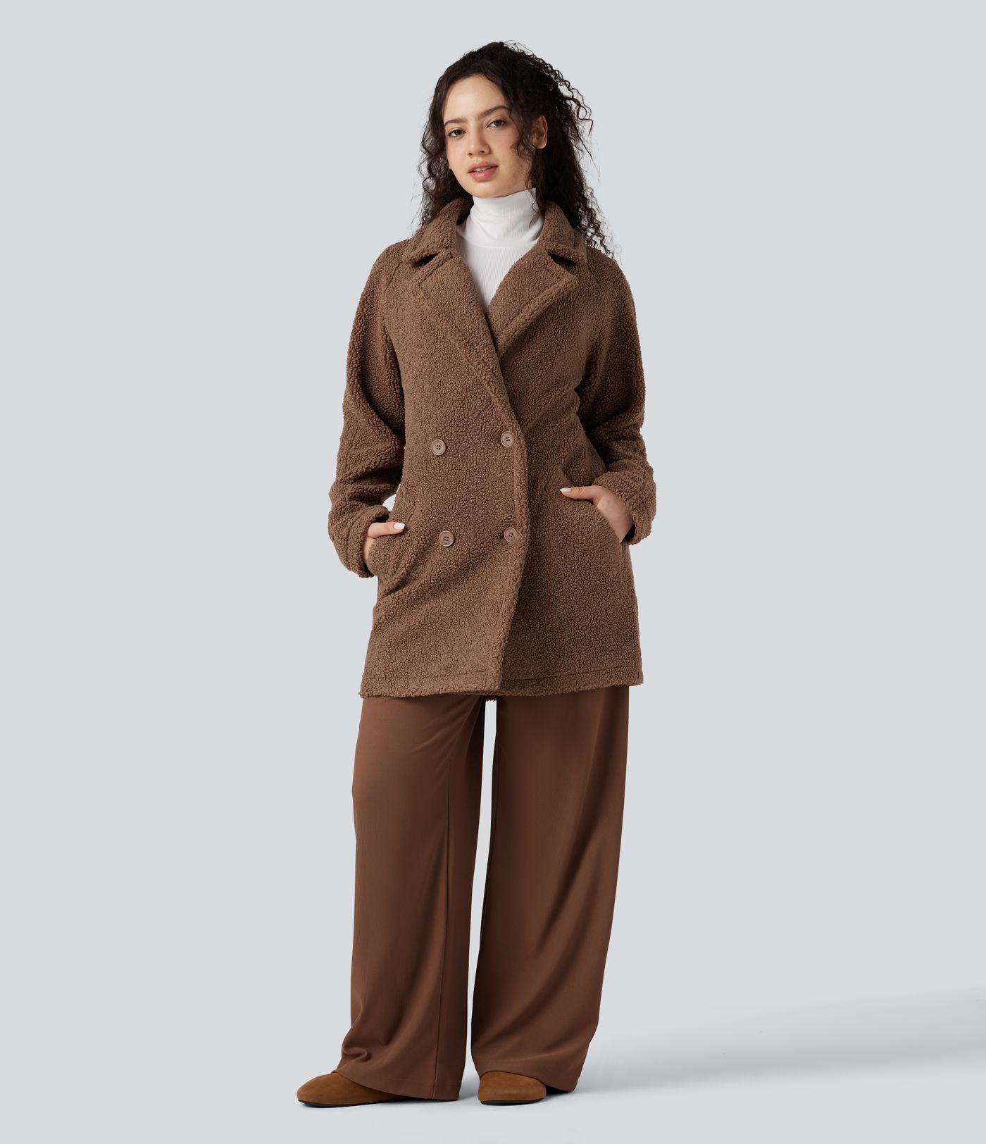 Manteau sherpa col tailleur coupe décontractée avec poches