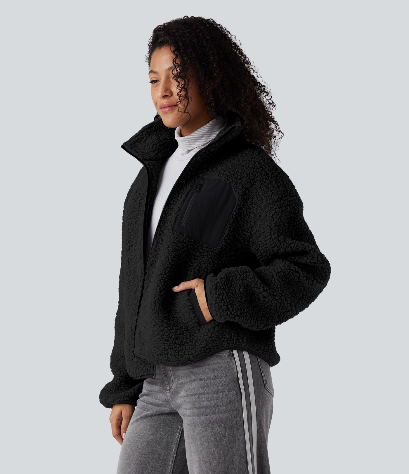 Veste sherpa col roulé manches longues avec poches