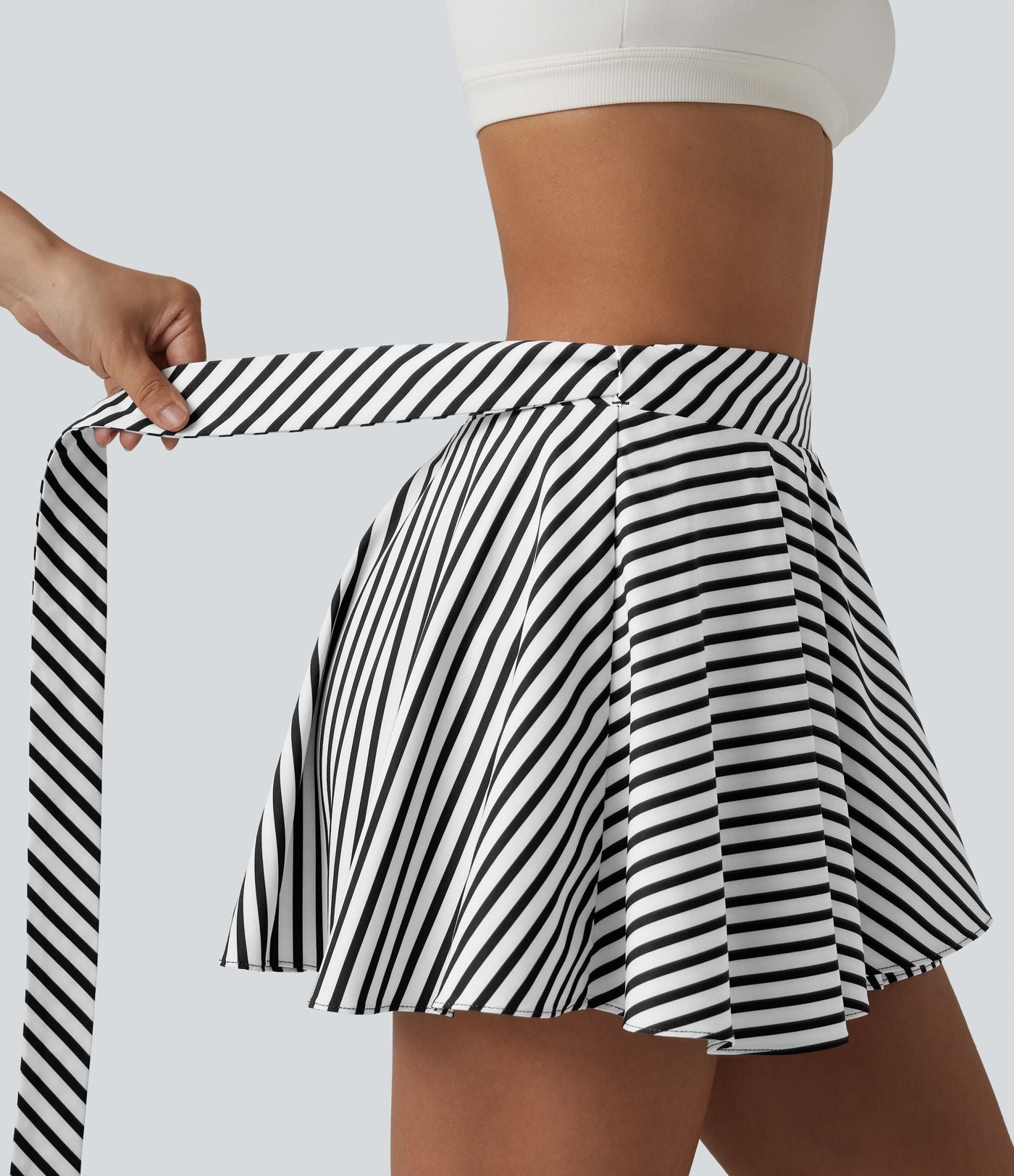 Jupe tennis mini fluide 2-en-1 taille haute imprimé léopard avec liens latéraux et poche