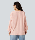 Sweat-shirt gaufré col échancré manches longues