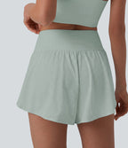 Short yoga 2-en-1 gainant taille haute à pois réfléchissants, ourlet arrondi croisé et œillets avec poches