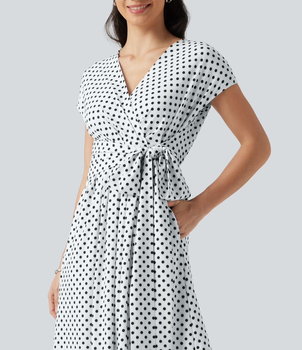 Robe midi à pois col V avec manches courtes, lien côté et poches