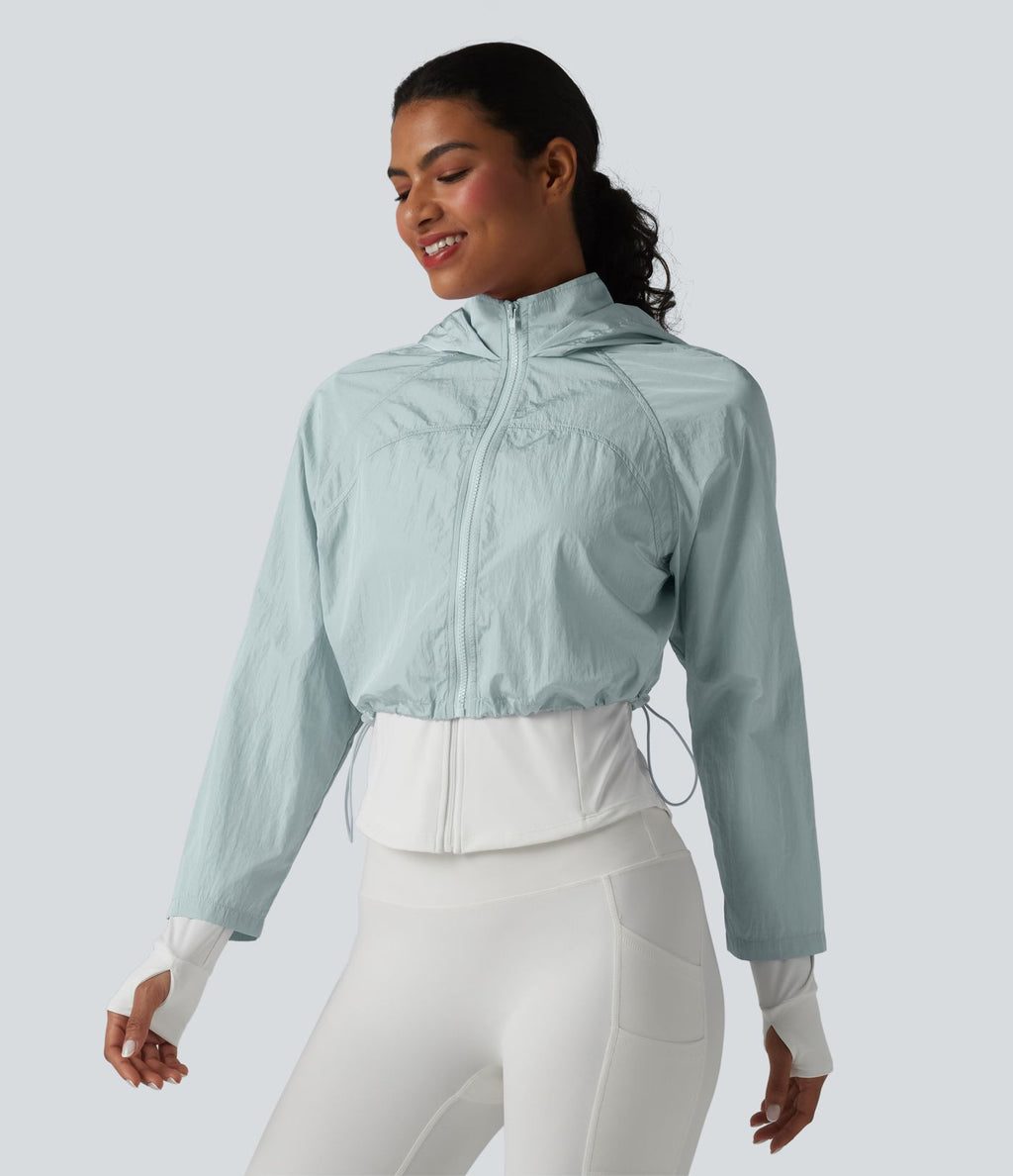 Veste de running 3-en-1 déperlante à capuche avec trous pour les pouces, ourlet arrondi et poches