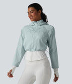 Veste de running 3-en-1 déperlante à capuche avec trous pour les pouces, ourlet arrondi et poches
