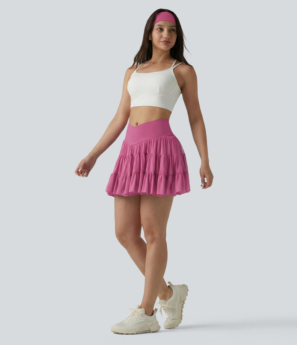 Jupe-short de tennis mini taille haute croisée fluide avec poches