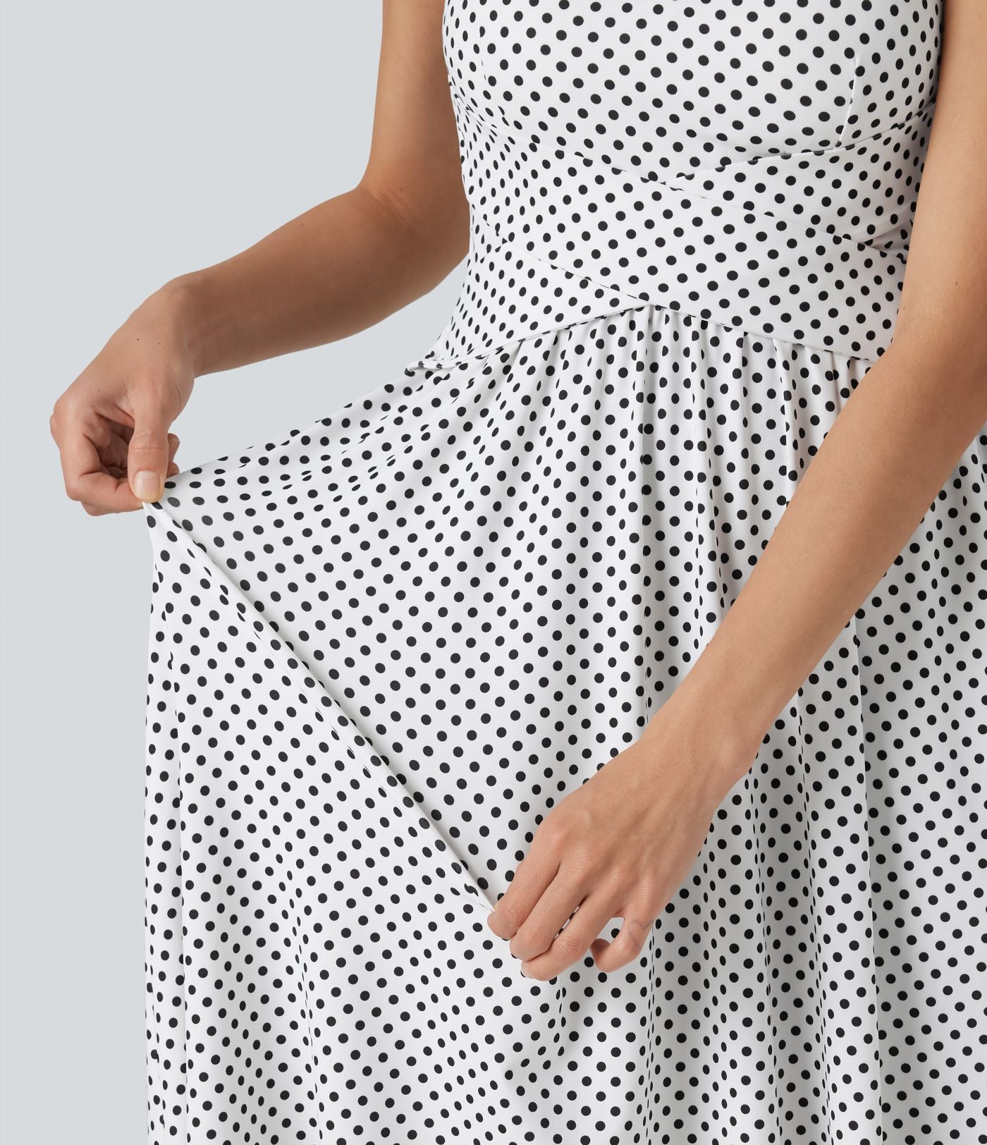 Robe fluide décontractée midi sans manches dos nu croisée à pois avec poches