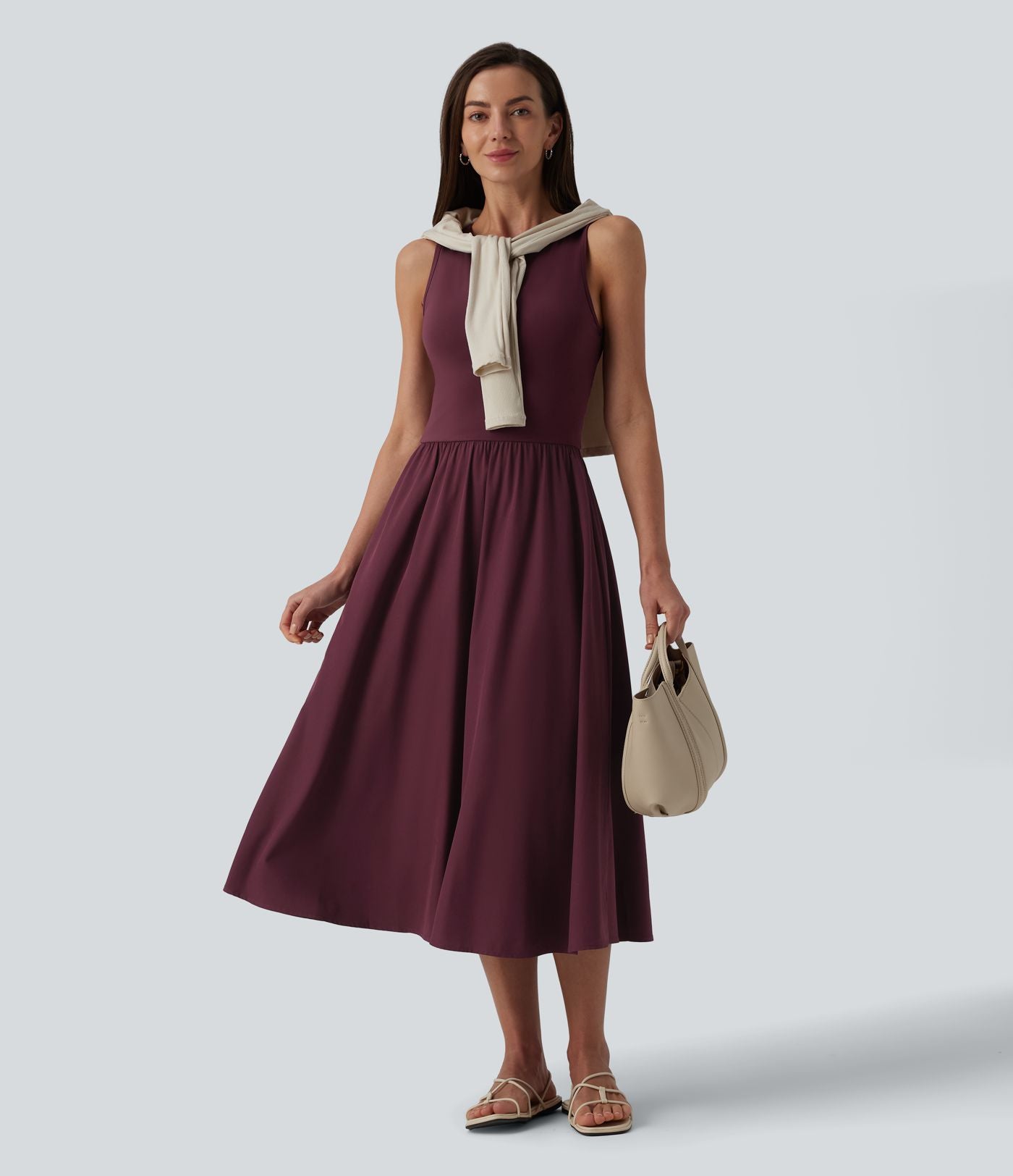 Robe mi-longue décontractée col rond sans manches découpes