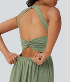 Robe longue fluide fendue avec poches latérales, dos nu et effet torsadé