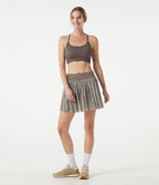 Jupe de sport mini 2-en-1 fluide taille mi-haute en mesh léopard avec poche