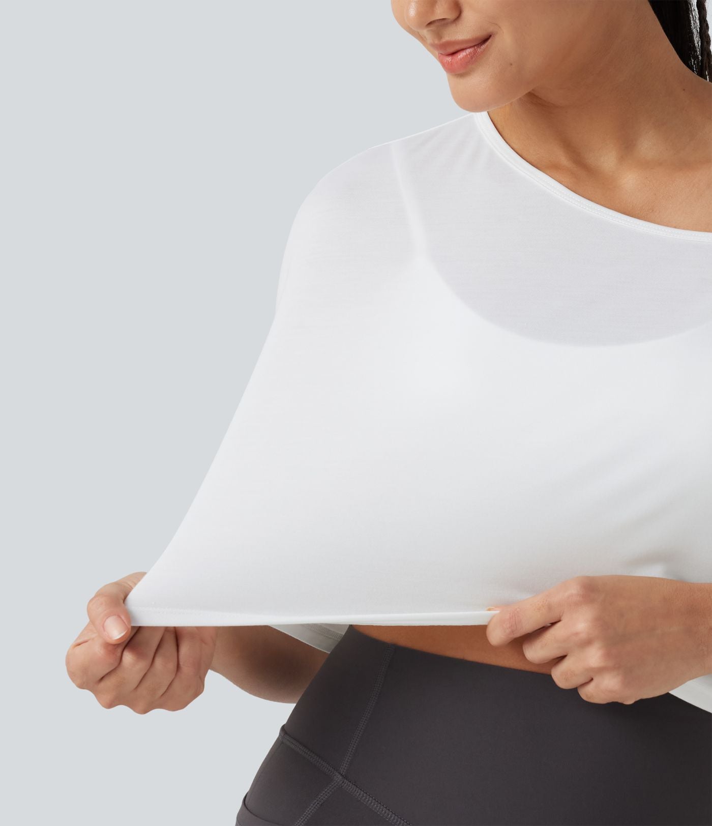 Haut de yoga court à une épaule, manches courtes, brassière intégrée, séchage rapide
