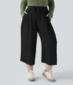 Pantalon grande taille large fluide taille haute avec cordon de serrage, poches et aspect lin