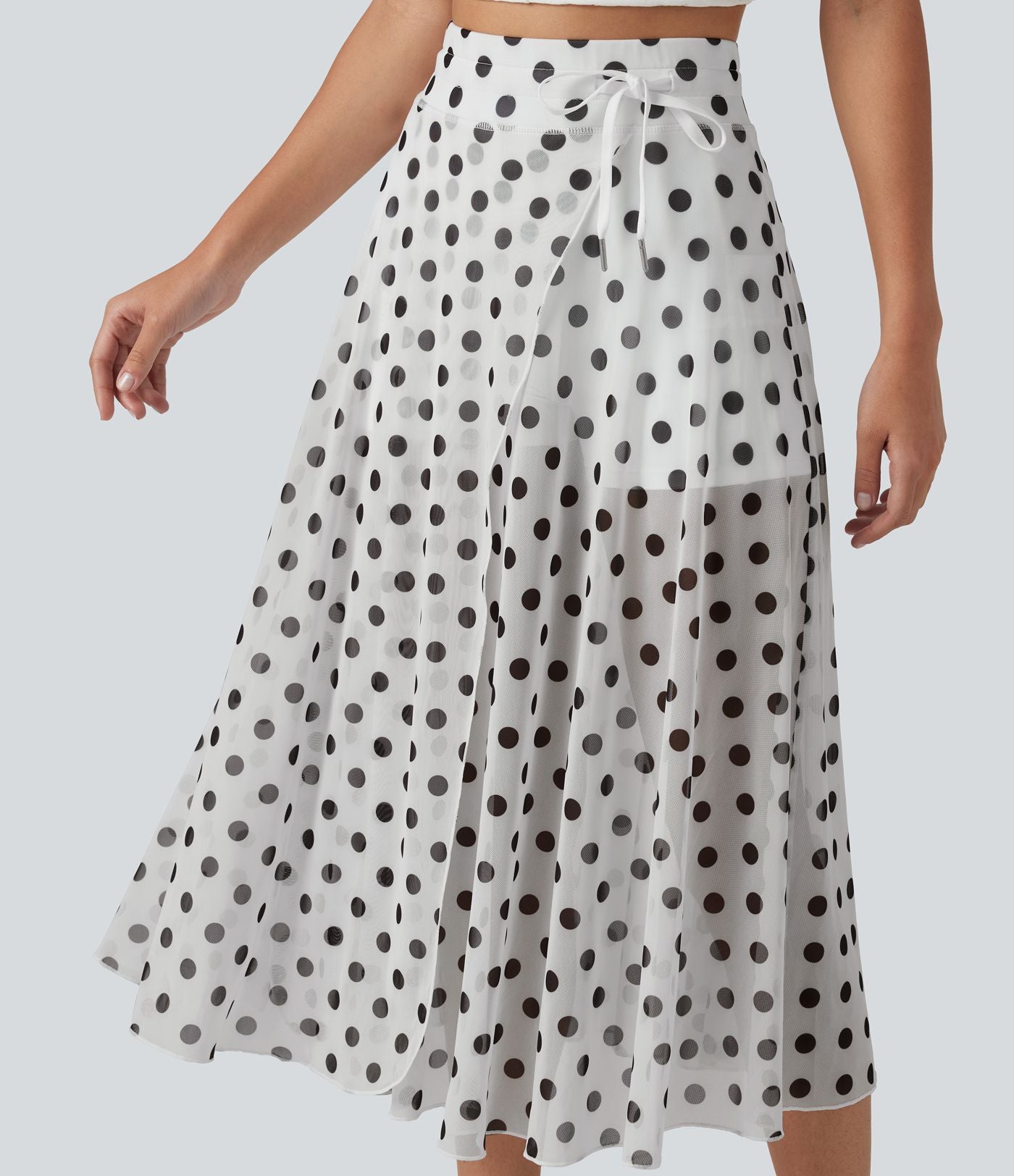 Jupe-short midi fluide évasée taille haute style vacances en mesh à pois avec cordon de serrage et poches
