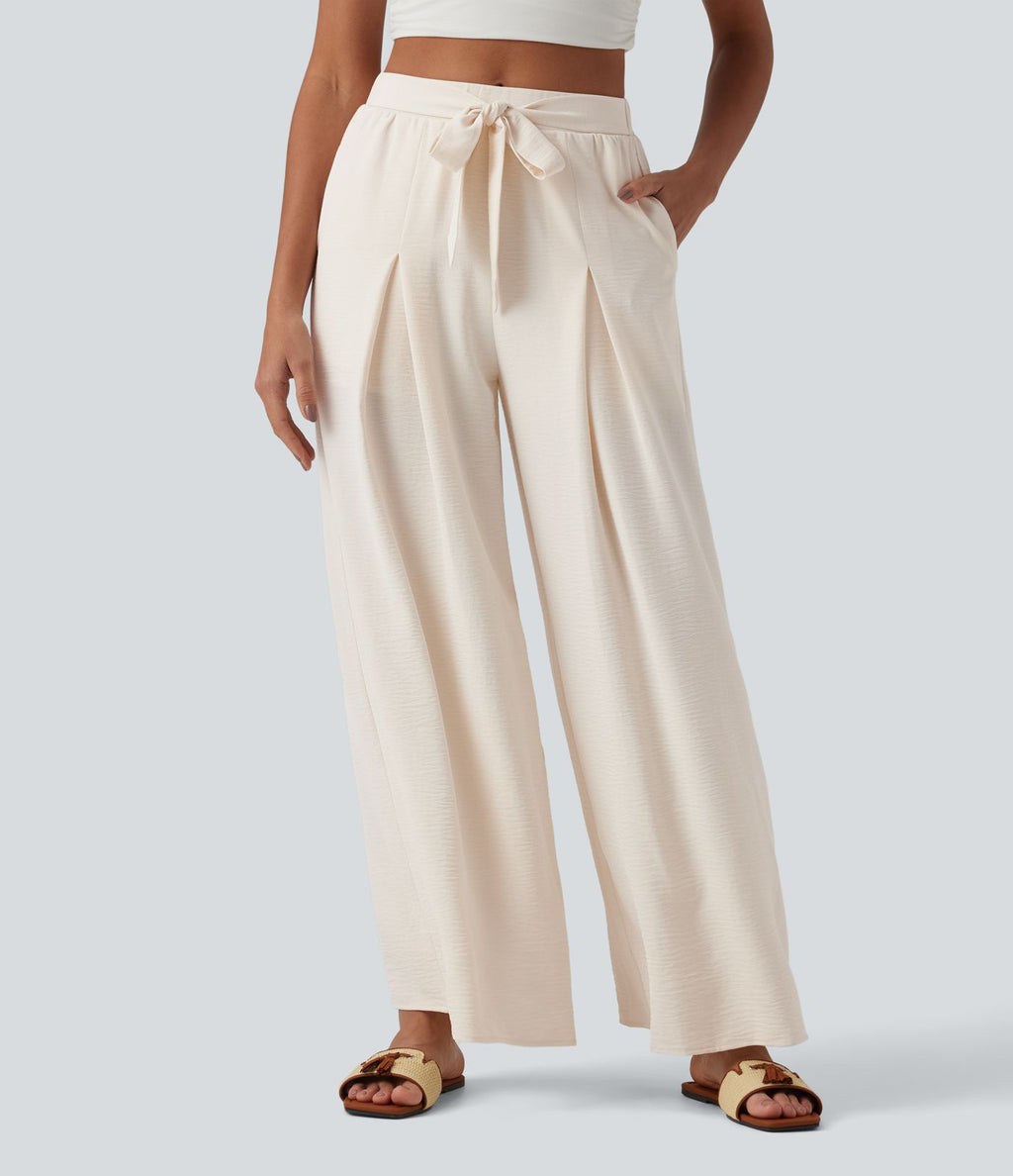 Pantalon large resort taille haute aspect lin avec nœud frontal et poches - Short intégré