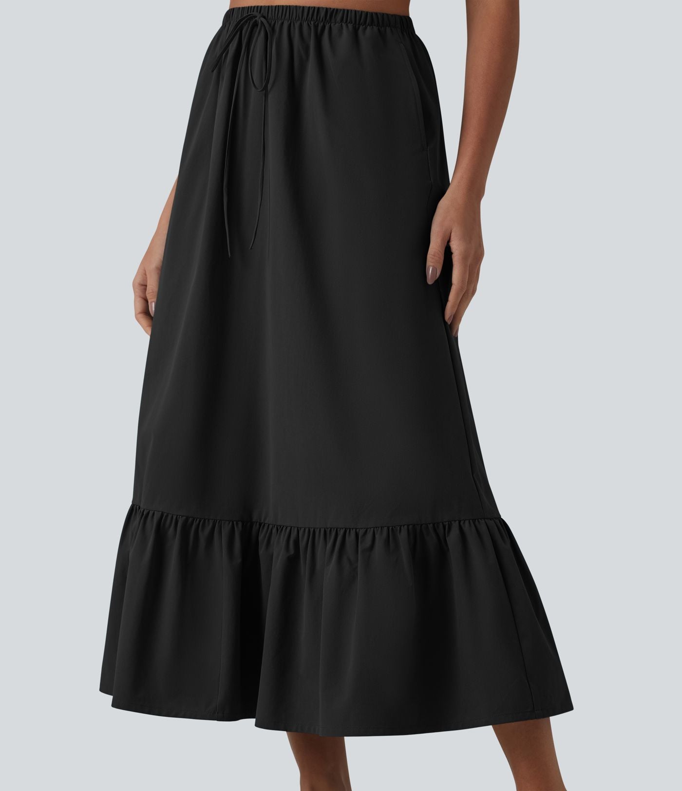 Jupe casual mi-longue évasée en popeline stretch taille haute avec cordon de serrage, ourlet volanté et poches