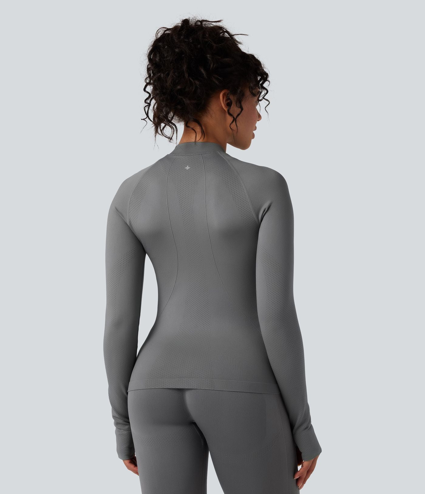 Veste de yoga Seamless Flow à fermeture éclair, manches longues et trous pour les pouces
