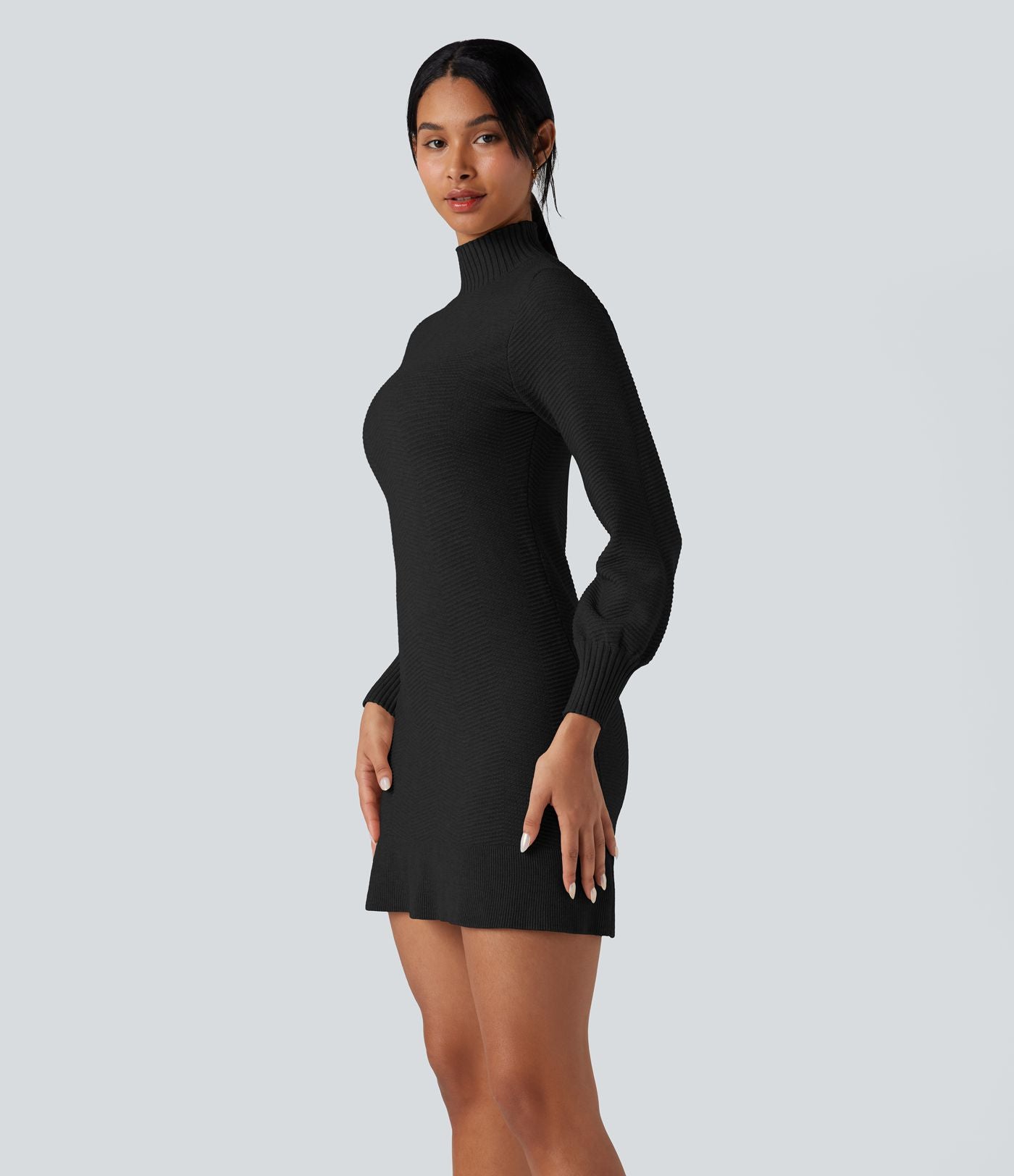 Robe pull courte col montant manches longues ourlet à volants