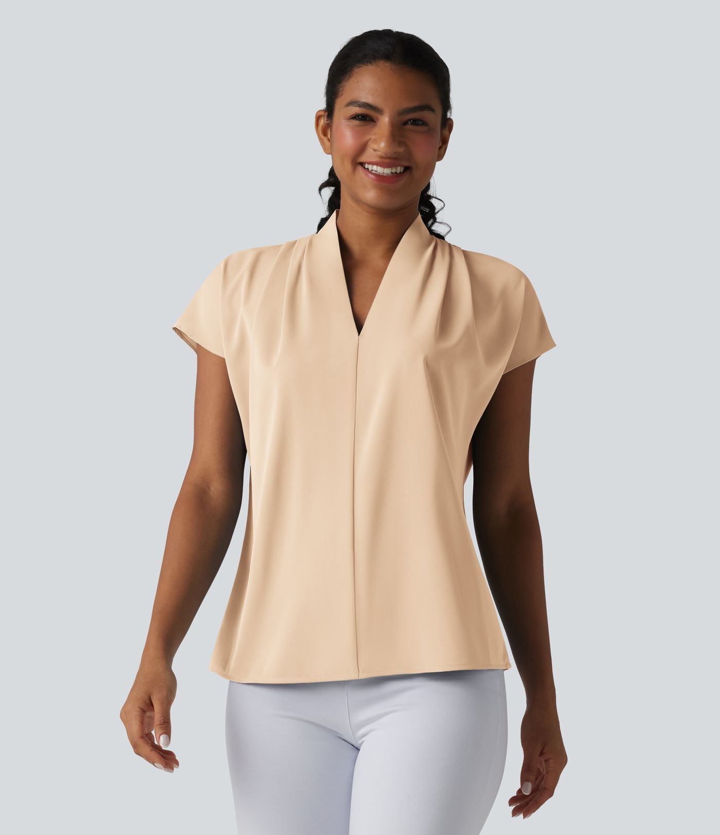 Blouse esprit bureau ample défroissage facile, col V et manches chauve-souris