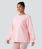 Sweat-shirt gaufré oversize col rond manches longues ourlet fendu avec poches
