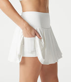 Jupe-short de tennis mini SoftlyZero™ QuickDry taille mi-haute gainante à plis avec poches