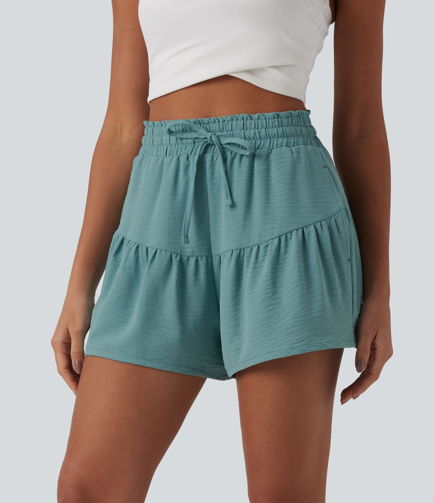 Short casual taille haute aspect lin volants avec cordon de serrage et poches 9 cm