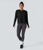 Top de sport running manches longues à découpes avec trous pouces