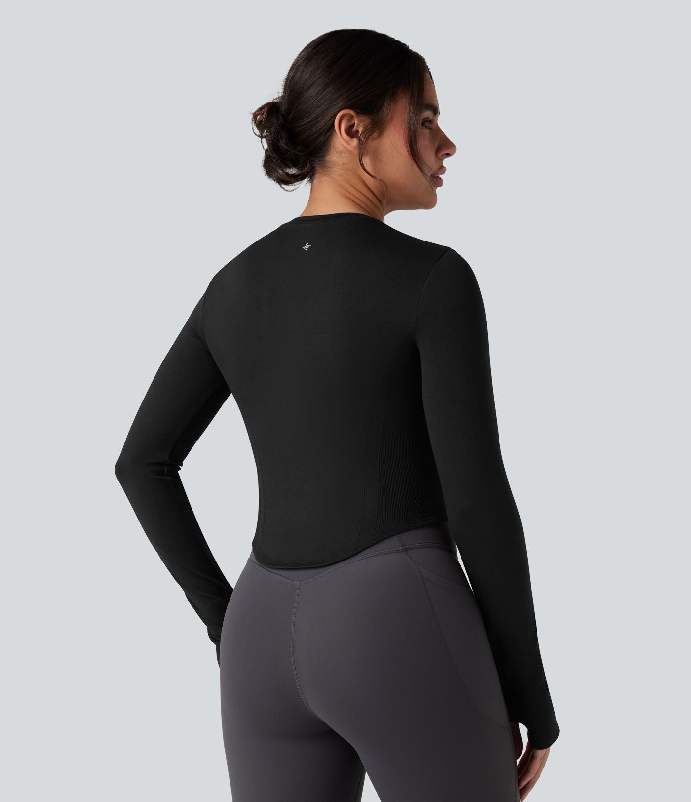 Haut de sport yoga col rond à manches longues avec passants pouces et ourlet arrondi sans couture Seamless Flow