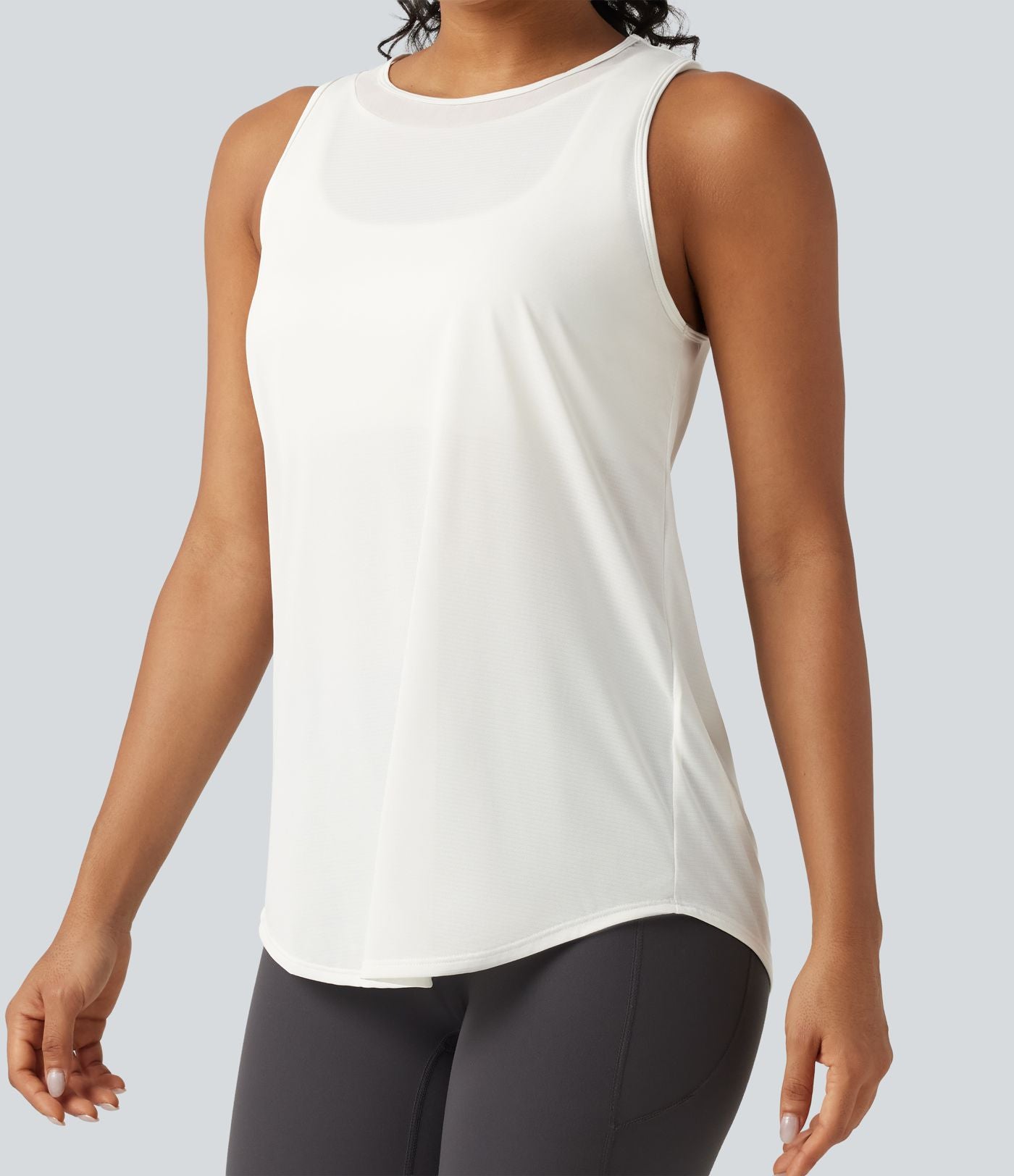 Débardeur de running longueur allongée en mesh contrasté avec ourlet arrondi
