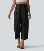 Pantalon casual court en coton et lin taille haute coupe ballon avec cordon de serrage et poches