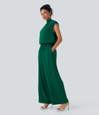 Combinaison pantalon tailleur jambes larges col montant dos goutte d'eau manches courtes avec poches latérales