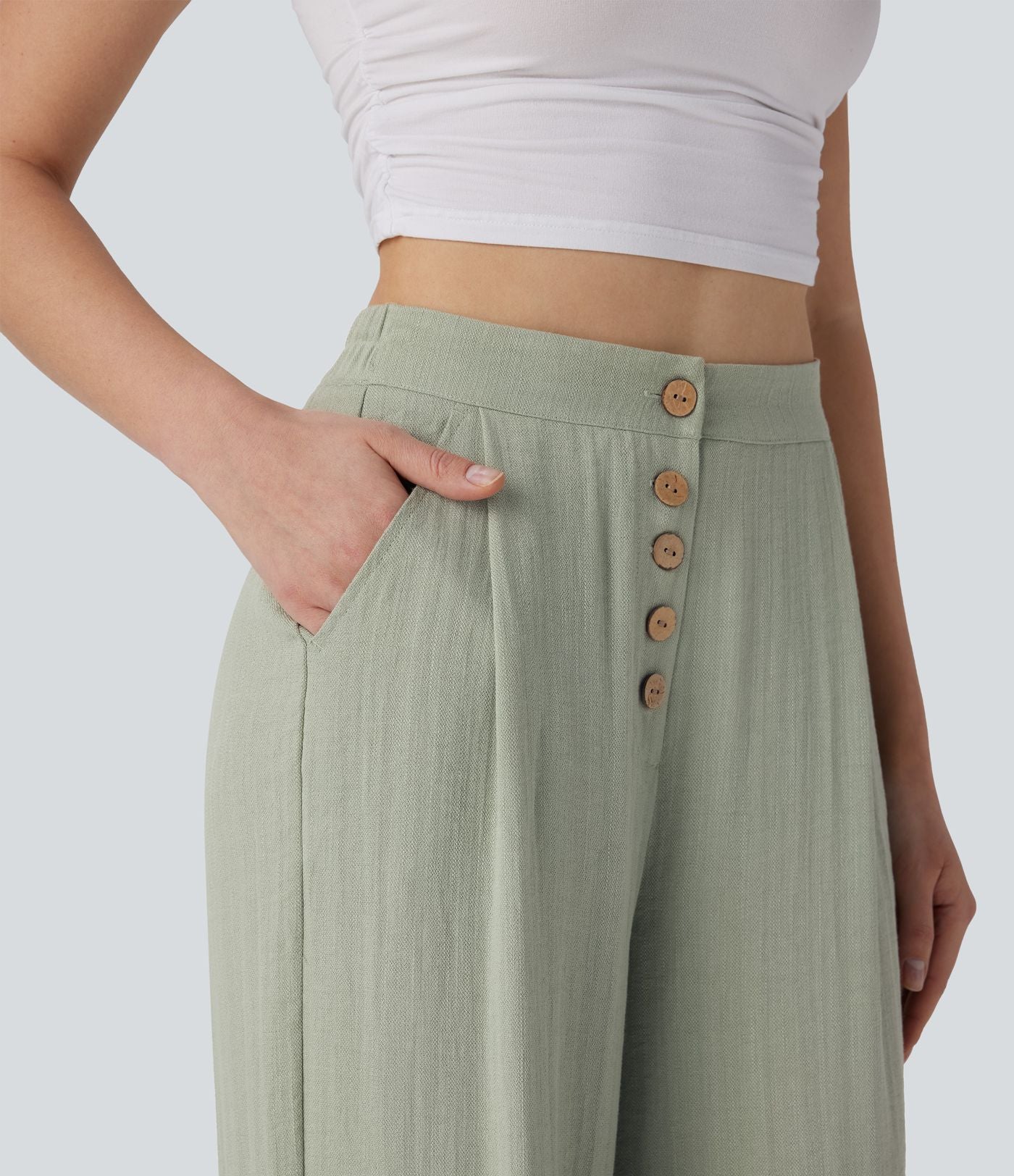 Pantalon large et fluide aspect lin taille haute, boutonné avec poches