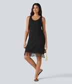 Robe mini sans manches col V avec ourlet à franges