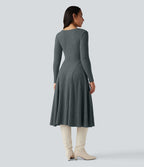 Robe mi-longue évasée maille côtelée à décolleté en V et manches longues