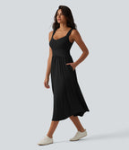 Robe midi fluide sans manches dos croisé, avec brassière intégrée (Bonnets E-G) et poches