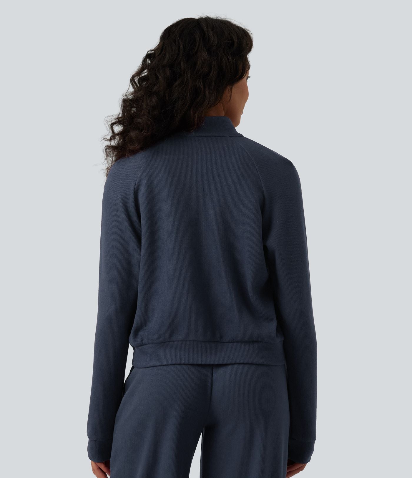 Veste casual côtelée à col montant, manches longues et fermeture zippée avec poches
