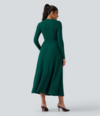 Robe mi-longue côtelée manches longues avec poches