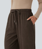 Pantalon taille mi-haute à cordon, jambe tombante en velours côtelé avec poches