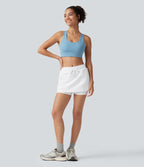 Jupe-short de sport mini SoftlyZero™ Airy taille mi-haute à ourlet croisé, toucher frais, cordon ajustable et poches