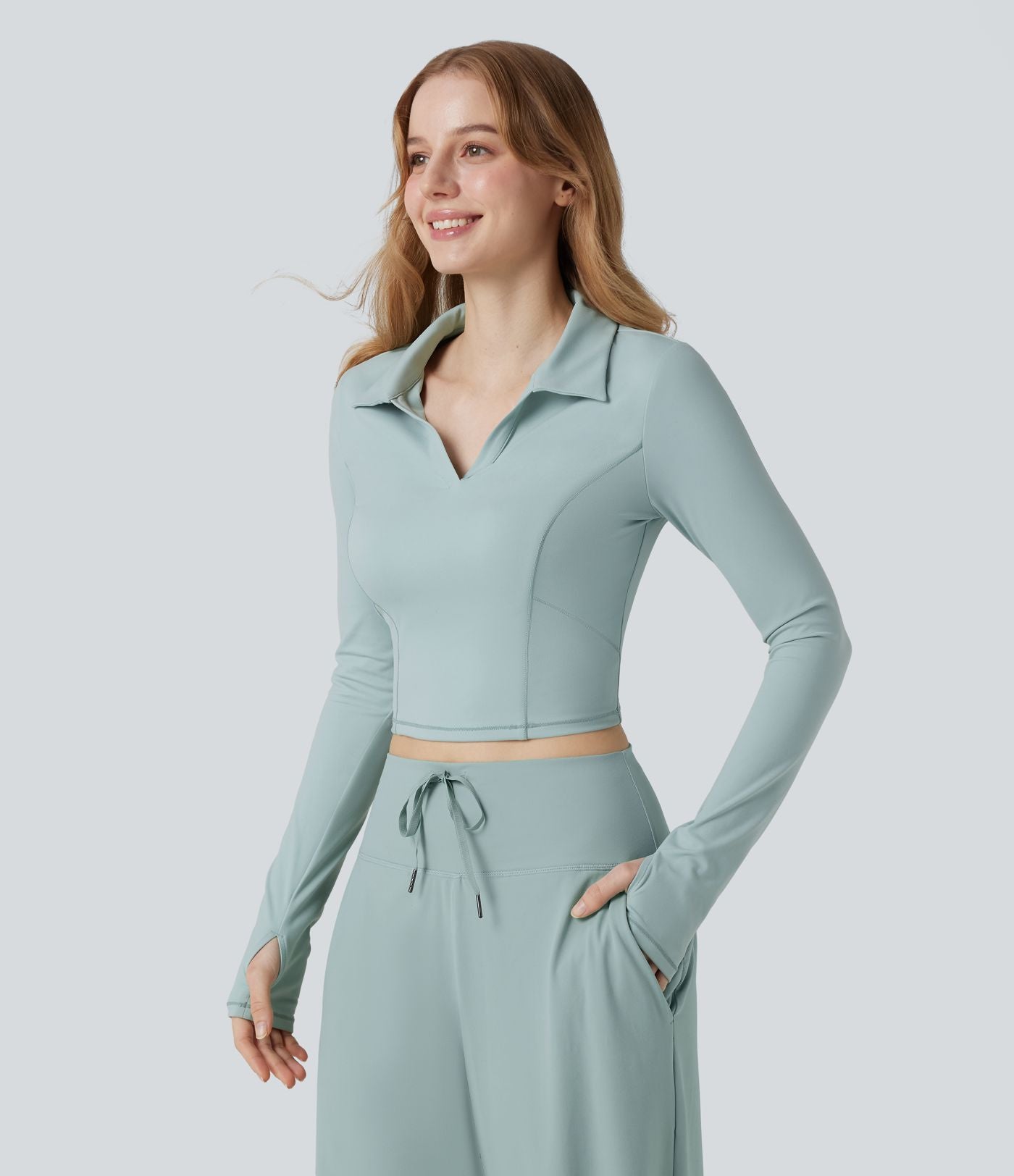 Top de sport tennis SoftlyZero™ Plush court col polo manches longues avec trous pouces