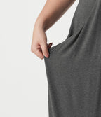 Robe maxi grande taille à col halter avec brassière intégrée, lien noué au dos et poches