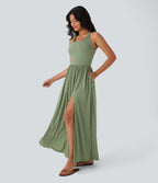 Robe longue fluide fendue avec poches latérales, dos nu et effet torsadé