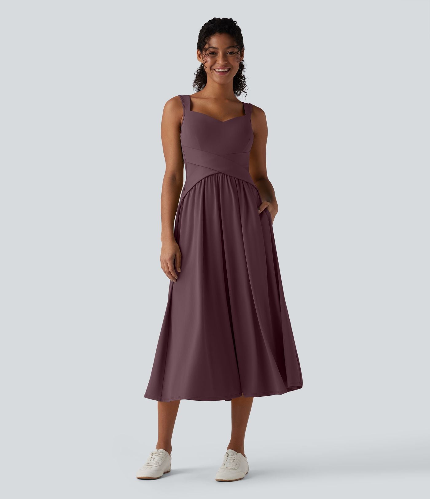 Robe midi fluide sans manches dos croisé ouvert avec poches