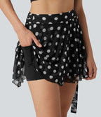 Jupe évasée micro-mini en maille à pois, taille haute, à nouer sur le côté et poche