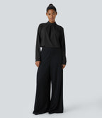 Blouse de travail à col montant, plis, boutons au dos et manches longues
