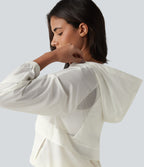 Veste de course à capuche à manches longues avec empiècements en mesh contrasté et poches – Protection UPF 50+