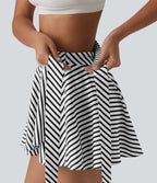 Jupe tennis mini fluide 2-en-1 taille haute imprimé léopard avec liens latéraux et poche