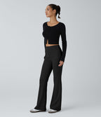Pantalon décontracté évasé en maille côtelée à taille haute et poches zippées latérales