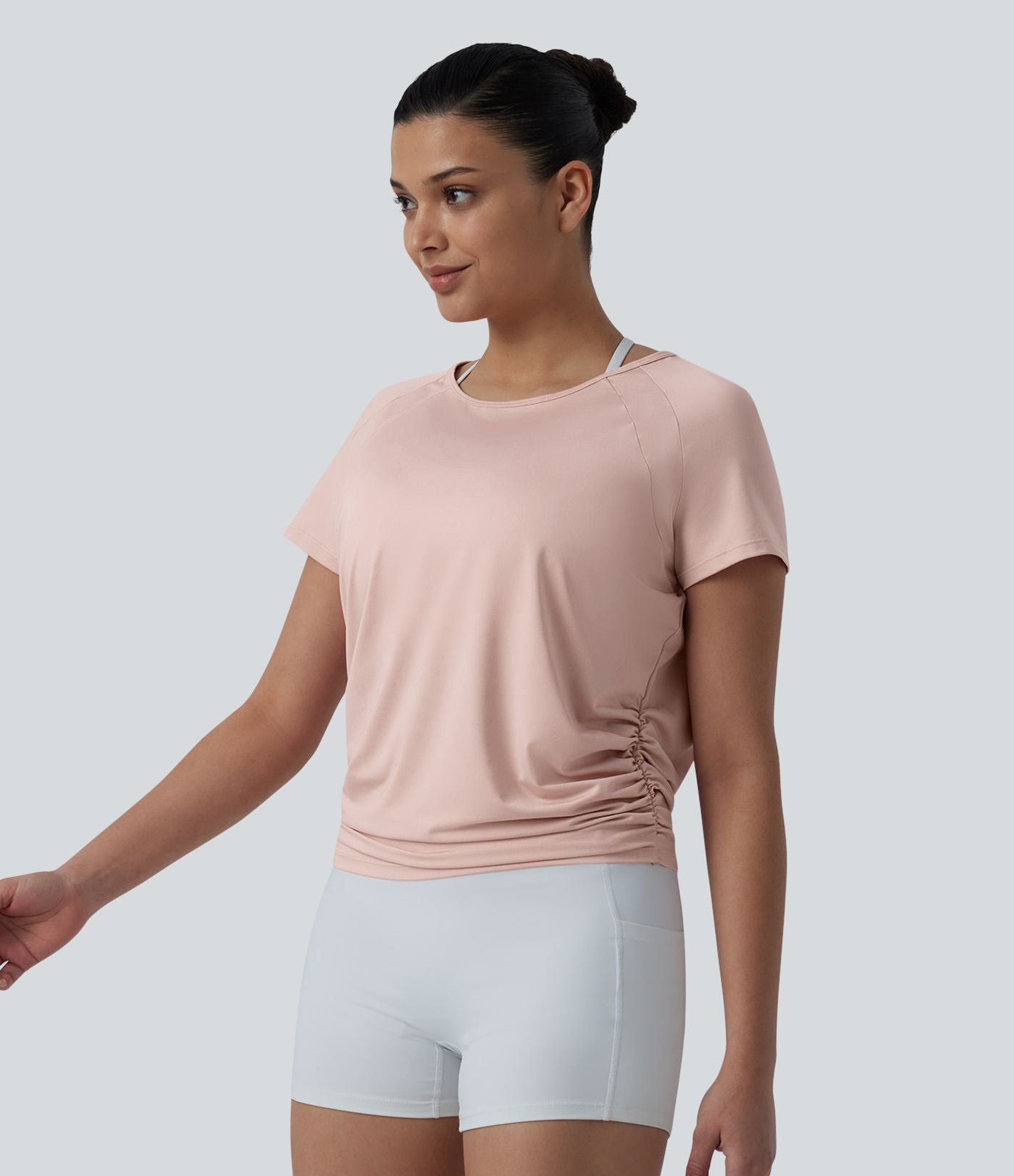 Haut sport yoga col rond manches raglan courtes dos découpé froncé