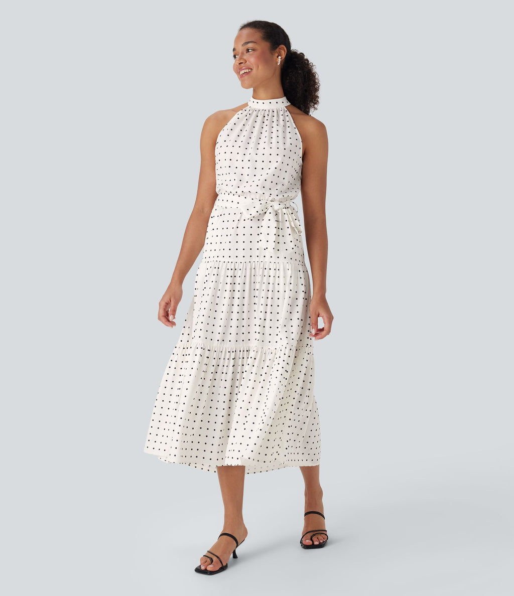 Robe mi-longue fluide de vacances à pois avec col licou, découpe dos, ceinture et poches latérales