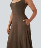 Robe mi-longue fluide col U sans manches avec poches