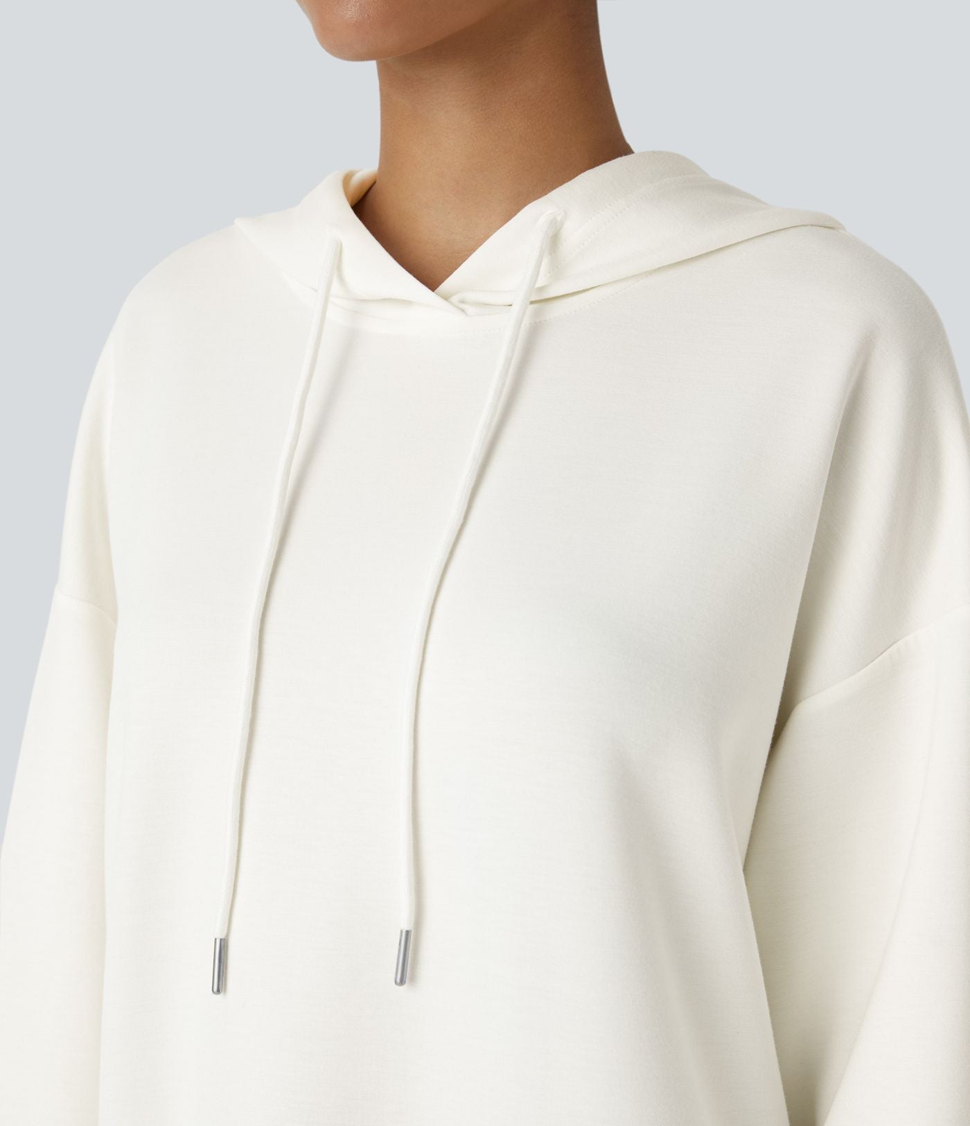 Sweat-shirt décontracté à capuche avec cordon de serrage, manches longues, poche kangourou, coupe croisée et fente